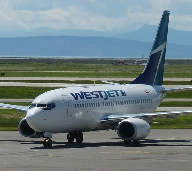 WestJet and Air Canada must offer extra free seat